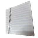 Interior del cuaderno mixto Torre con hojas rayadas y pentagramadas.